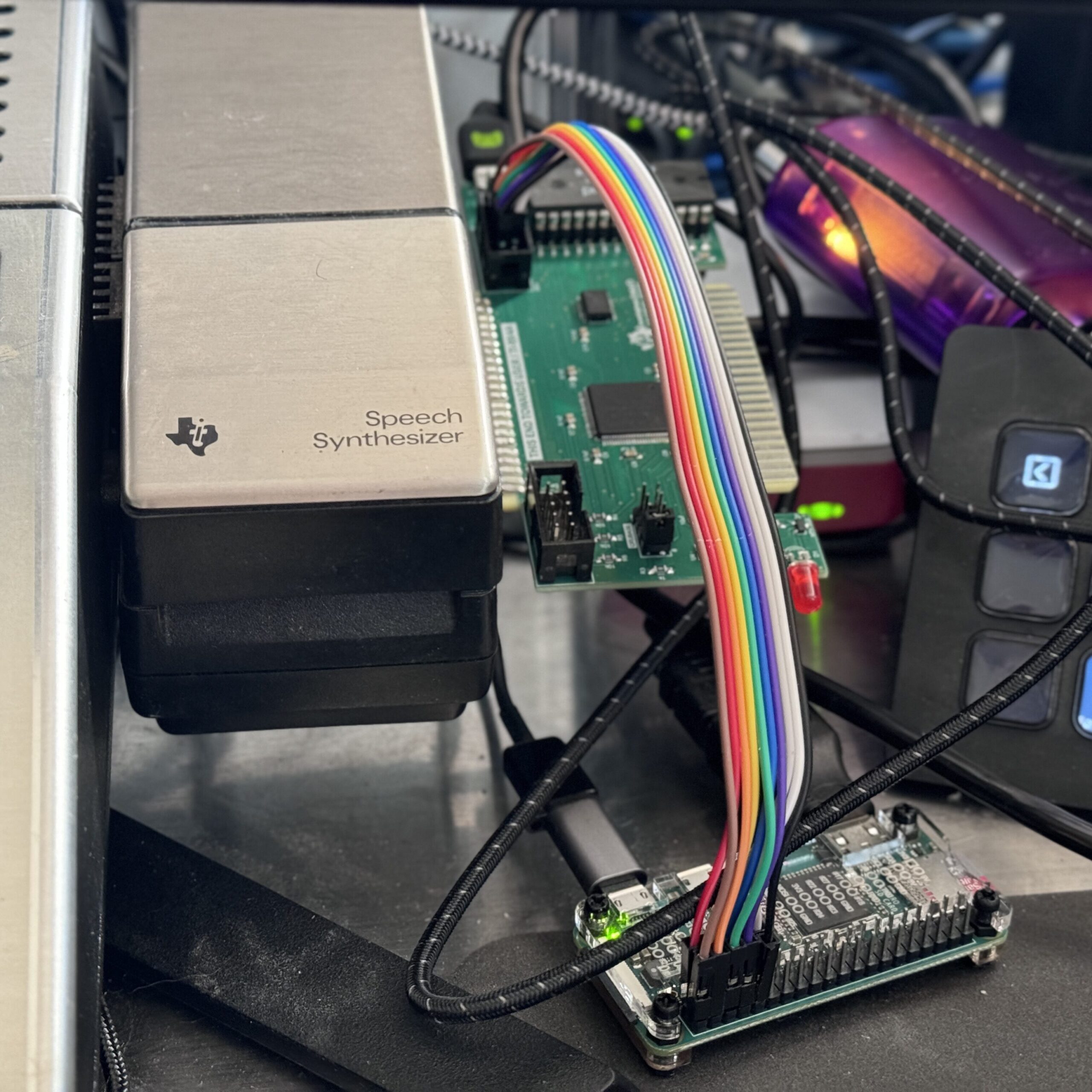 A TIPI PCS attached to a TI-99/4A computer with a Raspberry Pi0 attached